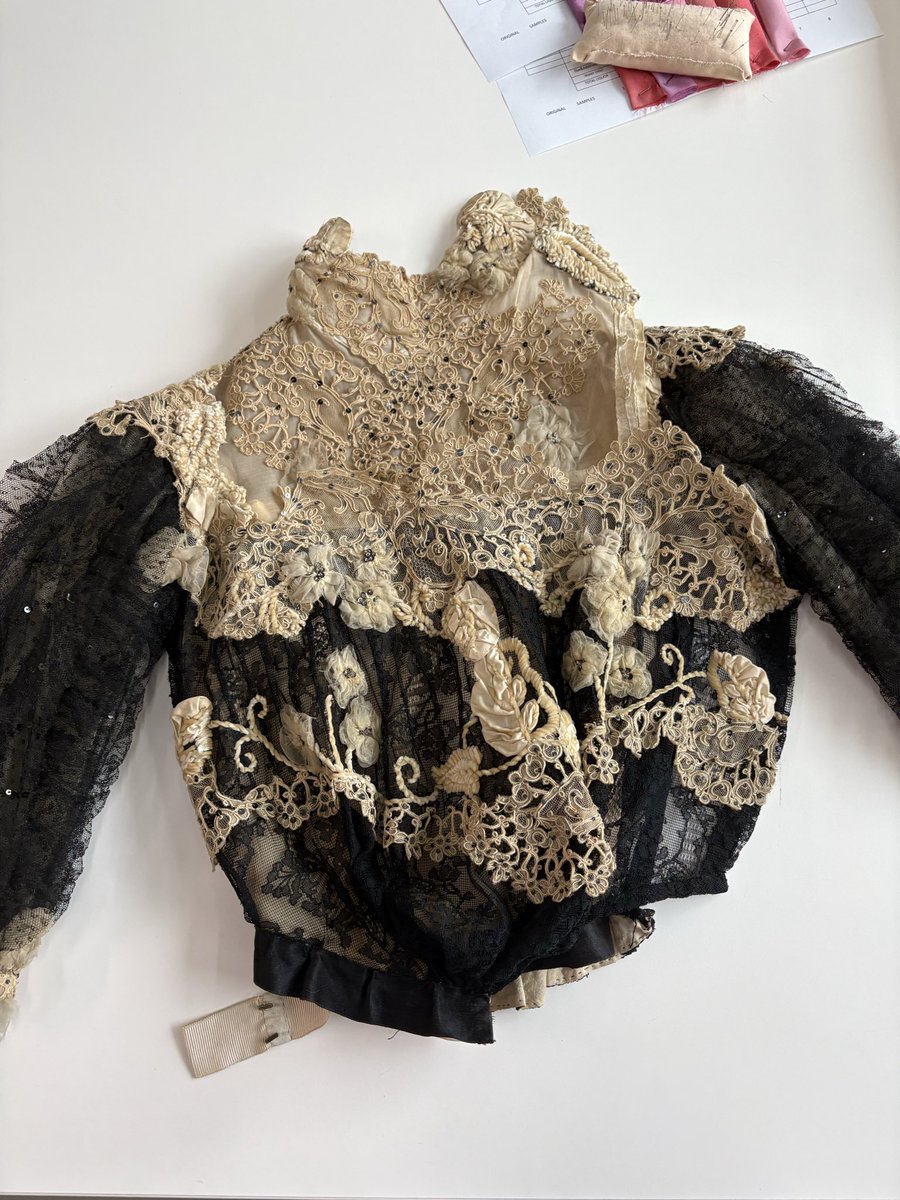 txetxarito's tweet photo. Next project: conserving this beautiful dress. Look at those stunning chenille flowers https://t.co/E6Kv2skuy7