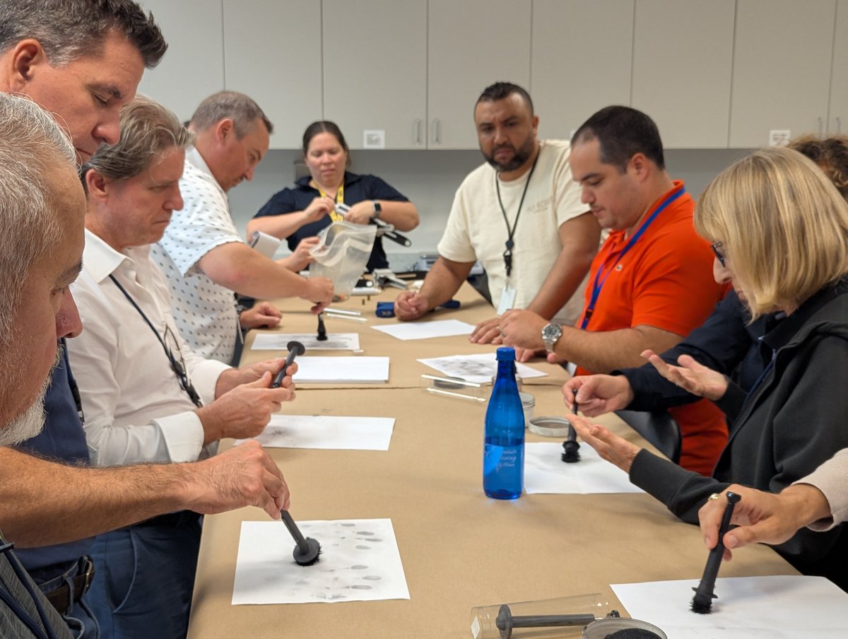 FBIMiamiFL's tweet photo. Last night, #FBIMiami SAC Brett Skiles and SA Alex Galeano spoke to the FBI Miami Citizens Academy class about the FBI's Evidence Response mission. Students took part in lifting fingerprints from different surfaces. https://t.co/DERSt8HLrw