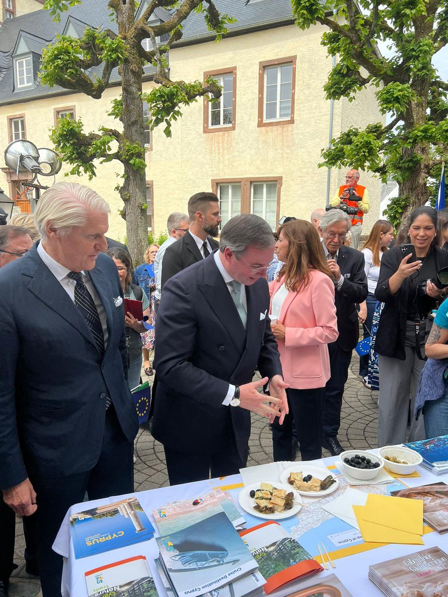 CyprusinNL's tweet photo. The celebration of Europe Day in Luxembourg in the presence of  @CourGrandDucale, who visited the Cypriot kiosk. Many thanks to the honorary consul, Luc Weitzel, for setting it up, and congratulations to @UE_Luxembourg for this exceptional event. 🇱🇺🇪🇺🇨🇾 #cy2026eu https://t.co/XxxSXK6mNH