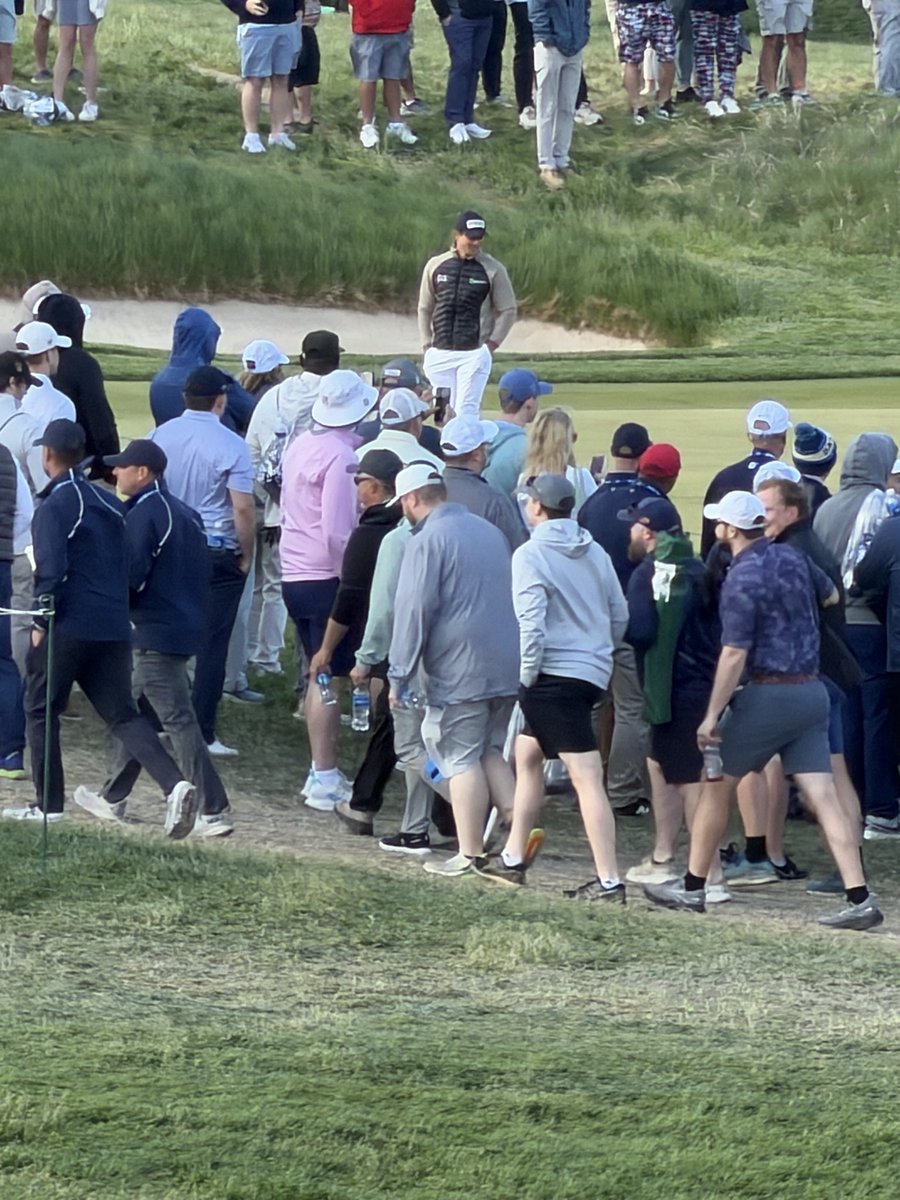 ckrabach's tweet photo. On 7 today but witnessed the hole out on 11 from my spot. Still very windy but came better prepared today. Look for the person wearing all versions of green. @hovihead @ViktorHovi https://t.co/BD3hbYSHAe