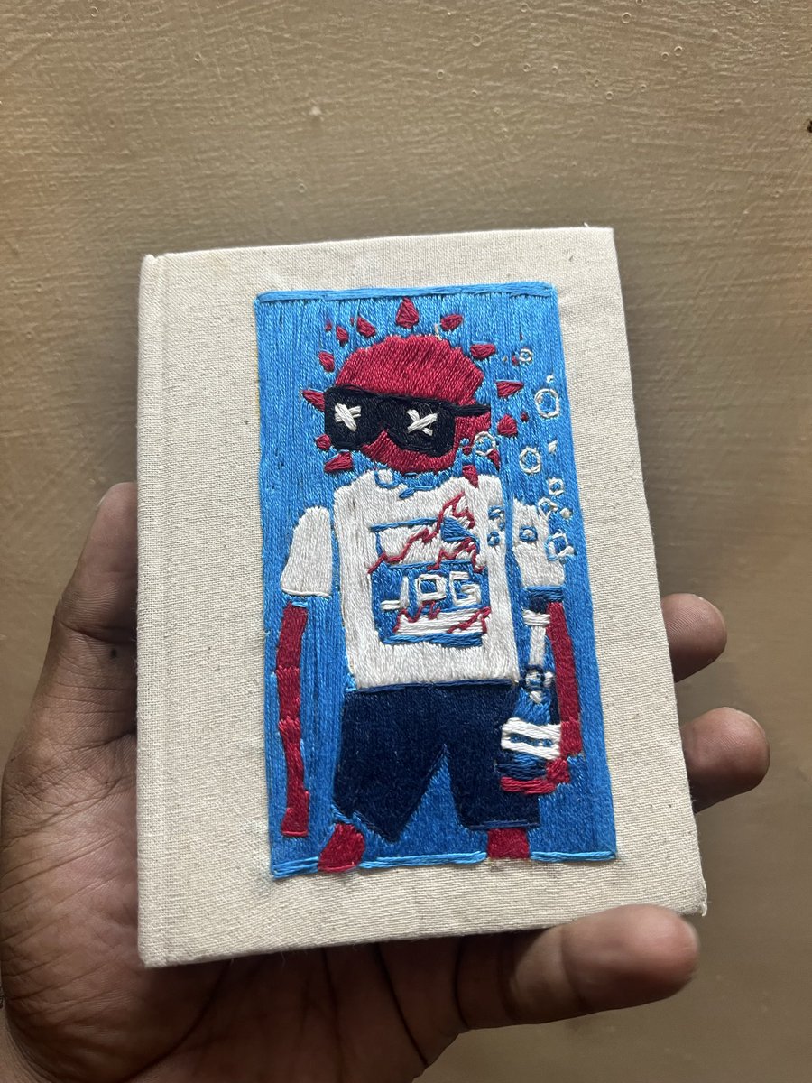 SummerMaxis's tweet photo. Commissioned a Summer.jpg Hand Embroidered notebook and got it delivered today!!! 

@XCOPYART @punk6529 https://t.co/St0xYnSDQU