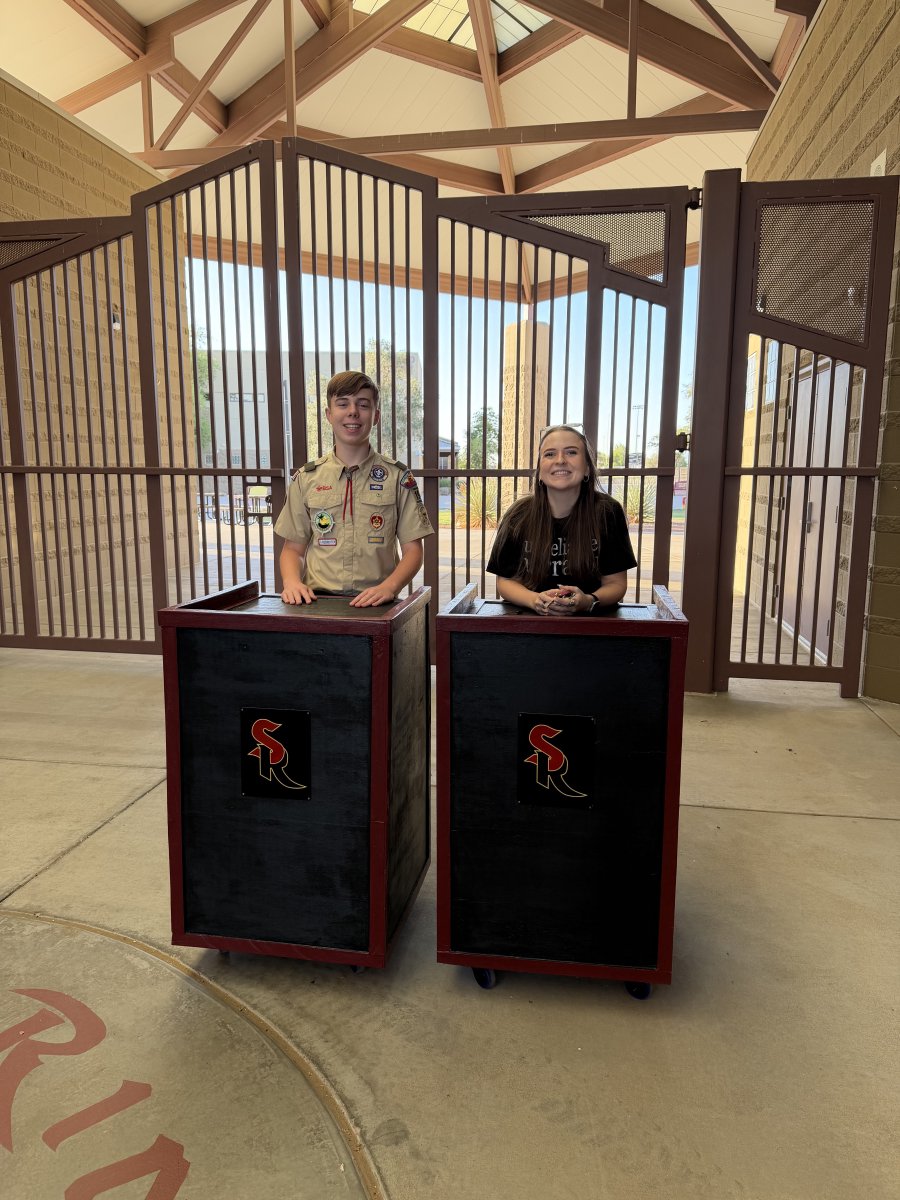 ShadowRidgeHS's tweet photo. Congratulations to Callum Smith for completing his Eagle Scout project and making podiums to provide to the English department. Ms. Waldon is the recipient of one of the podiums. Great job, Callum! https://t.co/hIdWfJINpz