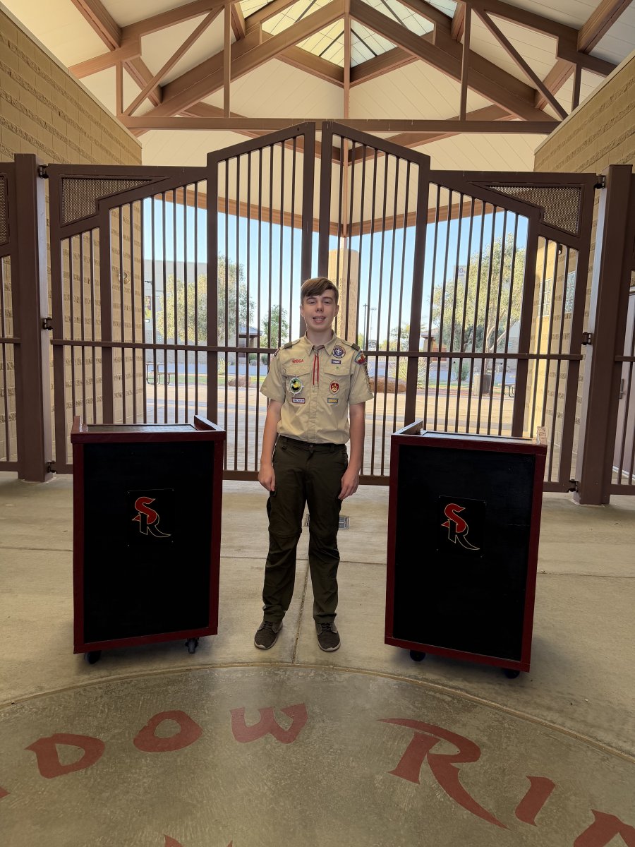 ShadowRidgeHS's tweet photo. Congratulations to Callum Smith for completing his Eagle Scout project and making podiums to provide to the English department. Ms. Waldon is the recipient of one of the podiums. Great job, Callum! https://t.co/hIdWfJINpz