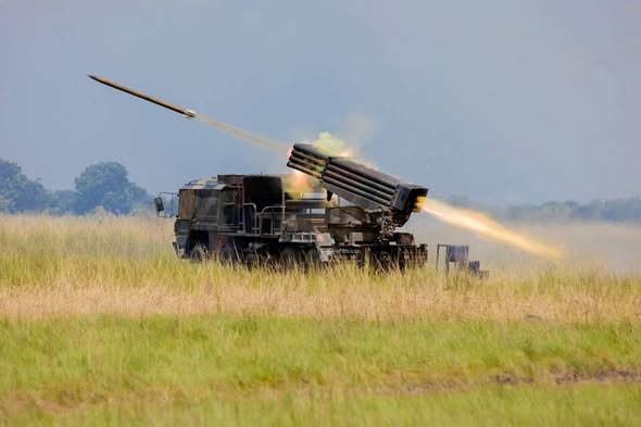 HammerOfWar5's tweet photo. Picture showing a german made 8 x 8 MAN KAT-1 truck of the Ghanaian🇬🇭military turned into self propelled multiple rocket launcher system with attachment of 122 mm rocket launch tubes. https://t.co/Y8StTPMI0f