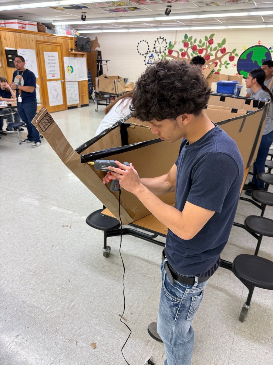 DJGaleana7's tweet photo. Students @IandGCenter have been busy this week building a card board #boat to complete in #techwars this coming Monday. The boat will compete in a race across the #NikiRowe swimming pool.  @gutiexfer @mcallenisd @CityofMcAllen https://t.co/a8gsb2IS4p