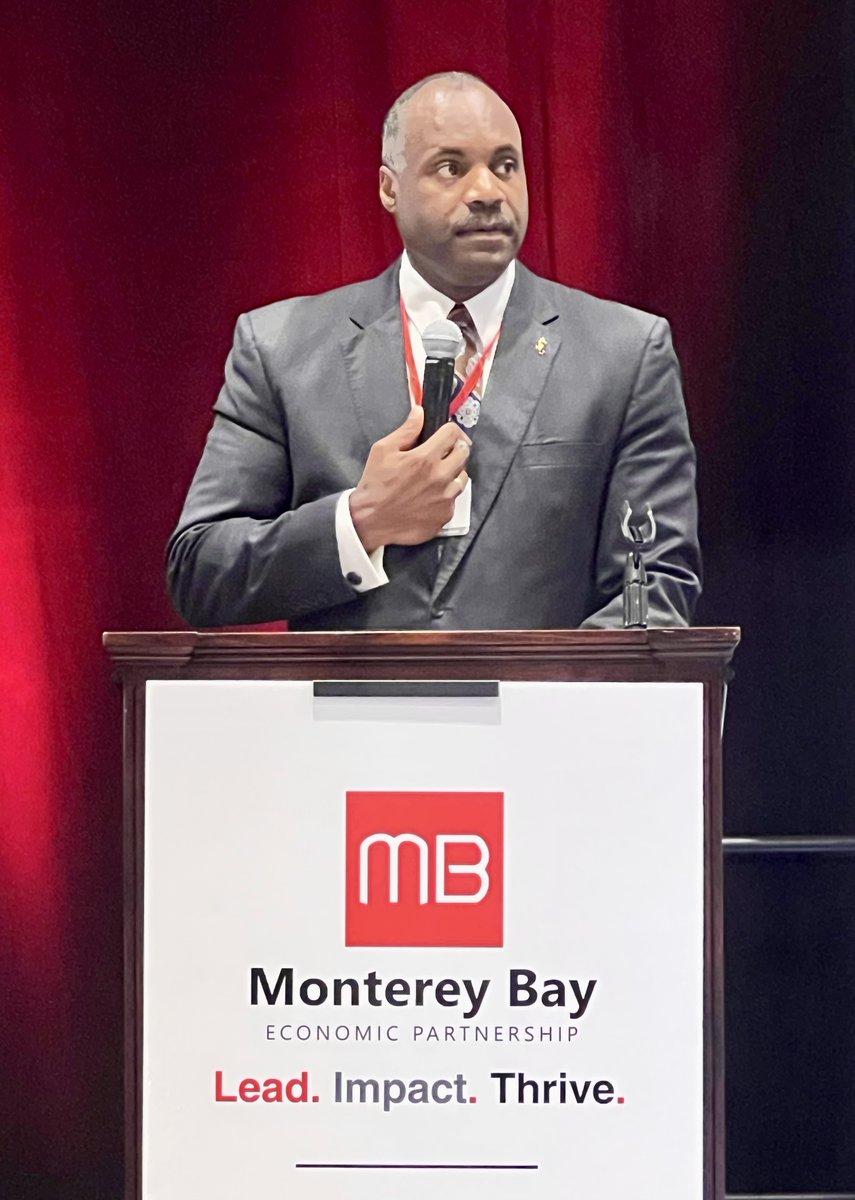 MBEPartnership's tweet photo. Seaside Mayor Ian Oglesby, MBEP Board President Faris Sabbah, and MBEP President &amp; CEO Tahra Goraya welcome a full house at MBEP’s 2026 Regional Economic Outlook. 

#economicoutlook #mbep https://t.co/Tbx8TlopLq