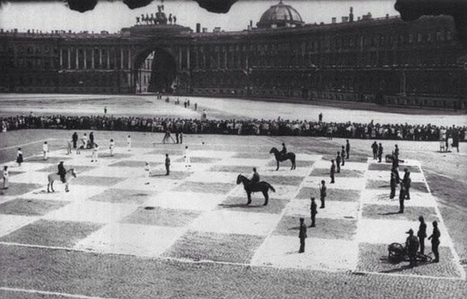 alliharvard's tweet photo. A game of human chess, St. Petersburg, Russia, 1924. https://t.co/lQOn3pbHXi