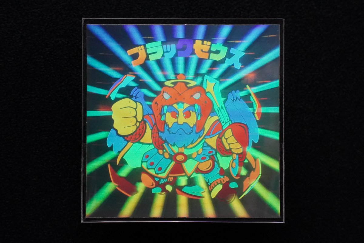 Sticker_Blvd's tweet photo. これ以上は未封入品しかないのでは？と思ってしまうほど綺麗なブラックゼウス。コレクションの中でも特に大切にしている一枚です #ビックリマン https://t.co/LHeL619orJ