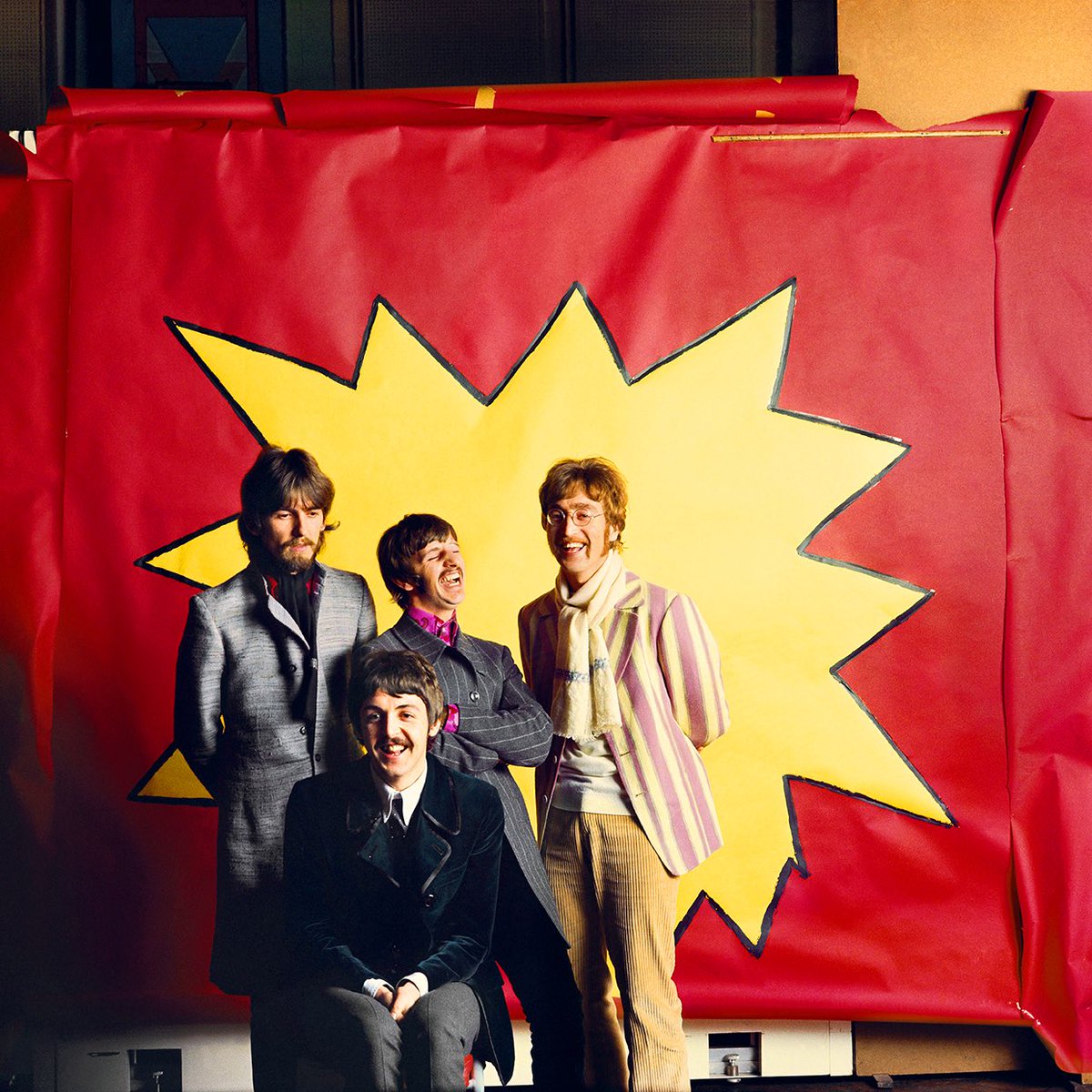 The_GM_is_God's tweet photo. The Beatles pose in front of the in-progress poster for James Gunn’s Super circa 1967 https://t.co/xHGLIliKzF