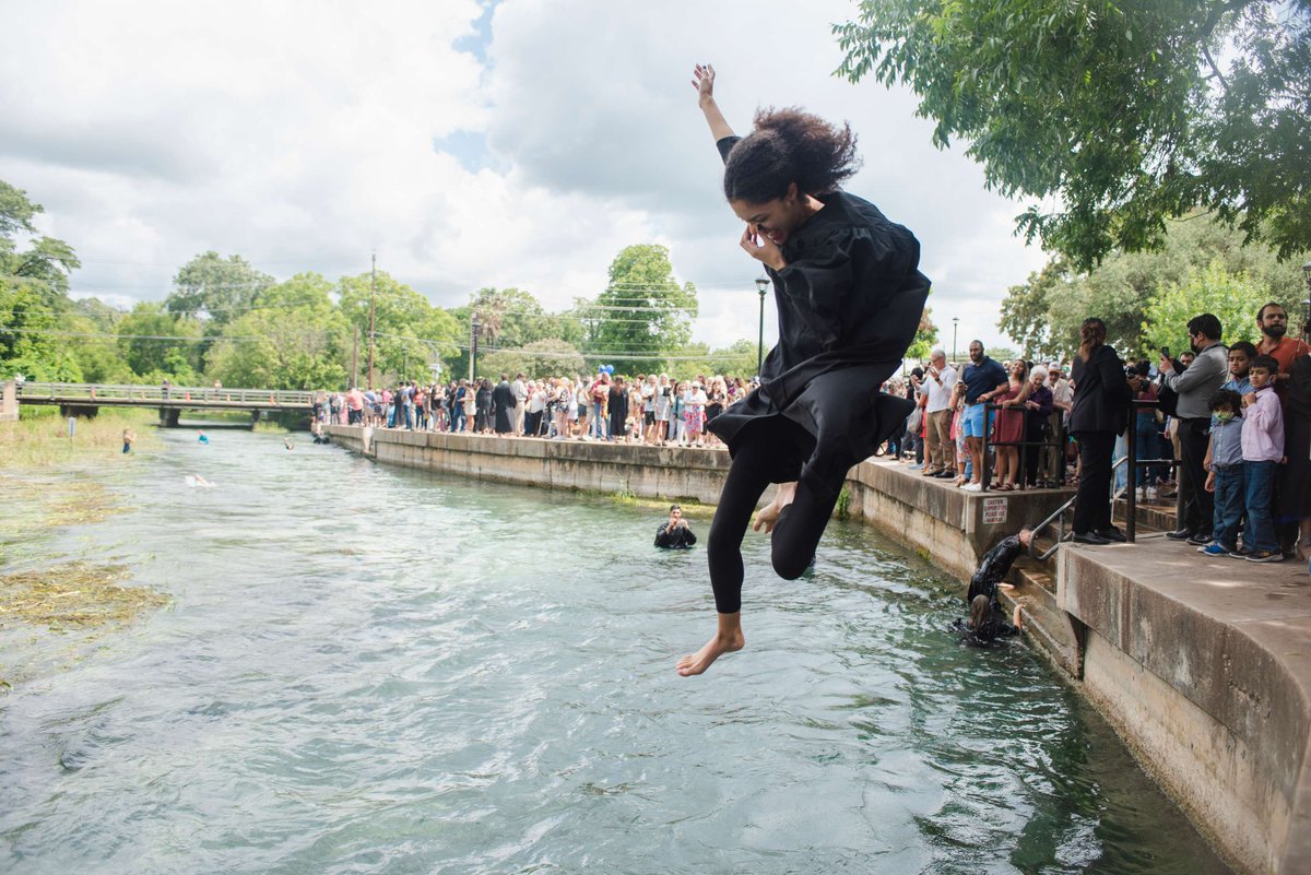 TXSTAdmissions's tweet photo. Congratulations to the class of 2026! 🎓 At TXST, students celebrate their hard work with a jump into the San Marcos River, a proud #TXST tradition! https://t.co/XrEYkHDJYH