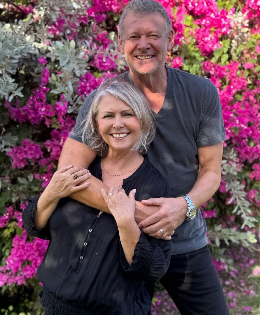 curveunofficial's tweet photo. A wonderful new photo of Toni and Alan 🌺. This photo is lifted from a new interview with the pair where they discuss their recent relocation to… the Caribbean! ☀️ 

The link is in bio for the full interview and makes for a very interesting read. 

Sadly, the interview does indeed confirm Toni’s retirement. That said, she’s earned it! We wish Toni and Alan all the very best on their latest adventure and it’s lovely to see and hear that they are both so happy. 

#curveband #curvemusic #tonihalliday #alanmoulder #deangarcia
