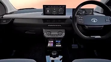 talks_turbo's tweet photo. New Tata Taigo 2026 interior looks a generation ahead with minimal looks and physical buttons. Overall, giving a segment above vibe.

I believe this is the current global phenomenon to give minimal interiors https://t.co/HFs8dEeIDb