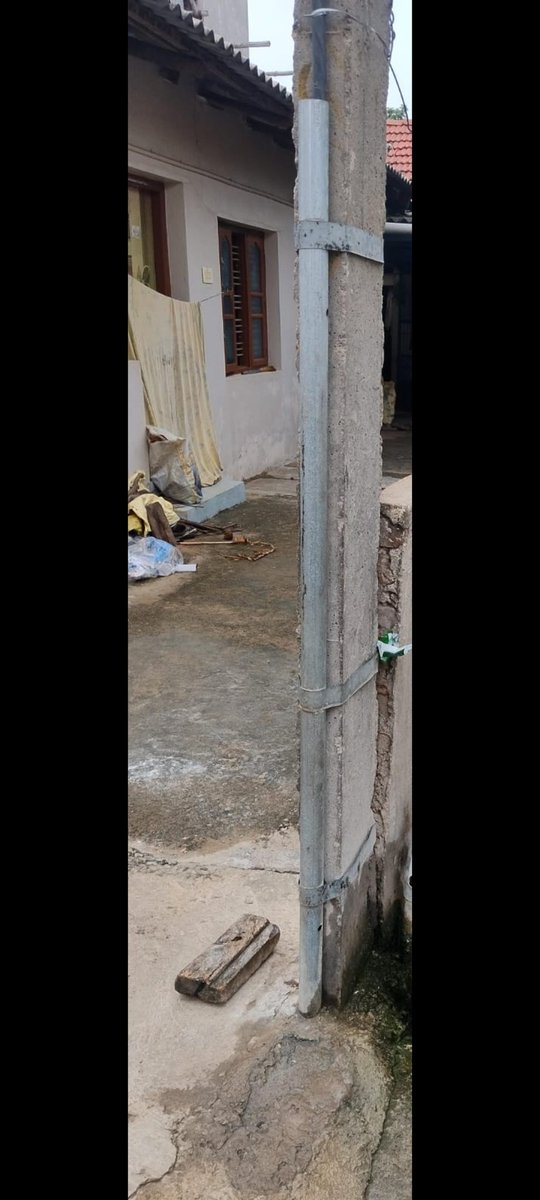 MGowda10's tweet photo. @NammaBESCOM 

Is it safe to put gi pipe for taking wire to home? As shown in picture it opens@ the top if rain it was collected in gi pipe.. Children's are playing near by, it is close to touch... Is it safe? https://t.co/XtFd62ZZEO