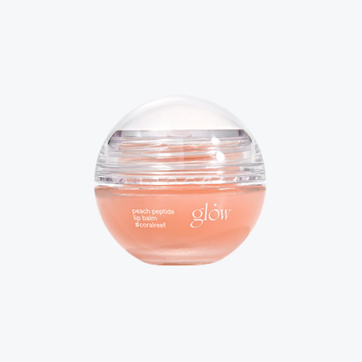 HONGSMINGKI's tweet photo. jongho doing the influencer hands to showcase his lip balm 🥹😭 he said he got it as a gift and really likes it so he always carries it around (and because its cute!!) so if anyones curious its from the brand glow! peach peptide repair lip balm in coral reef https://t.co/7nUpZqij4N