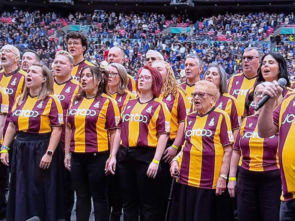 eflpublished's tweet photo. Bantam of the Opera have just unveiled Bradford City’s new home kit for the 2026/27 season ahead of the FA Cup final between Manchester City and Chelsea 👕 

The choir of Bradford City fans were on the Wembley pitch as part of the pre-match ceremony 🐔 

#BCAFC https://t.co/waWT5ceMOM