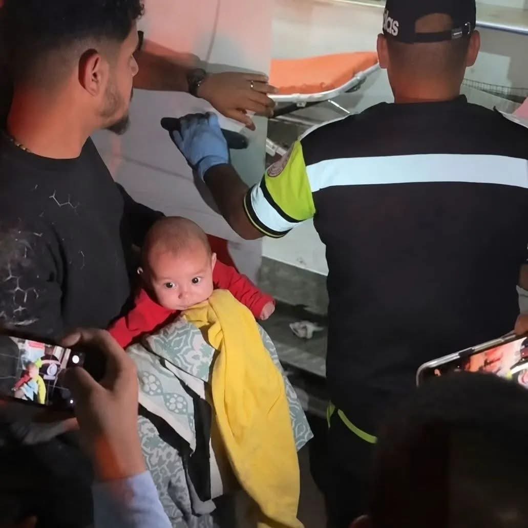 Astridueil's tweet photo. My little angel

In Gaza… this was the scene just moments ago…

There is no time for a peaceful childhood, no safe bed, no embrace strong enough to shield this little child from the sound of missiles.

Just moments ago, this child was injured in an airstrike targeting a building in central Gaza. He emerged from the smoke and terror carried in people’s arms, with tiny eyes that cannot understand why all of this is happening.

What sin have children committed to grow up to the sounds of explosions instead of songs?

And what heart can bear the sight of an infant surviving death while still searching with frightened eyes for safety?

Gaza does not need words of pity…

Gaza needs this pain to stop.

Its children deserve to live as children everywhere else in the world live:
without bombardment… without fear… without saying goodbye every single night.

O Allah, protect the children of Gaza,
have mercy on their weakness,
and grant them a life untouched by the sound of war.