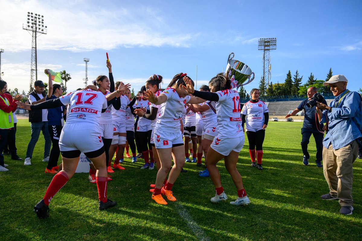 Image for the Tweet beginning: Tunisia lift the trophy in