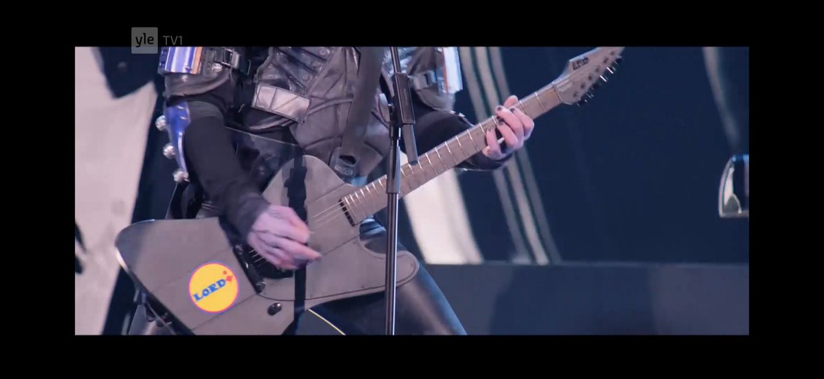 inspirito's tweet photo. Was there just a @LidlSuomi promotion in #Eurovisión2026 #euroviisut2025 #Eurovision?!? Had to rewind and noticed the sticker on the guitar says actually #Lordi in the #Lidl typography 😂 https://t.co/q7YsnjWB1J