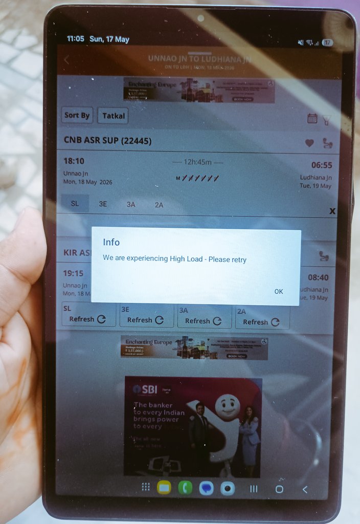meschwarzengger's tweet photo. I was trying to book tatkal ticket on irctc app . I logged in at 11 am but since then it shows we are experiencing high load . Is there anyone who can book tatkal tickets online, then why is this irctc app for. @IRCTCofficial @RailMinIndia @RailwaySeva  @AshwiniVaishnaw 😞 https://t.co/xoyL0IUlSk