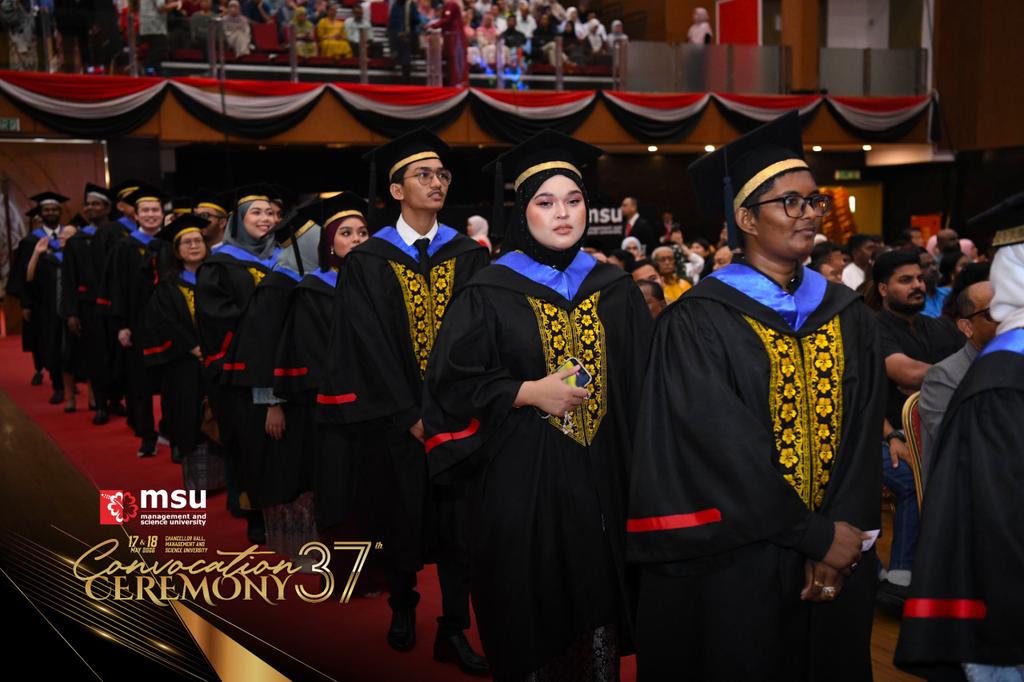 MSUconvo's tweet photo. The academic procession makes its way into the hall, marking the official commencement of today’s ceremony 🎓✨ #MSUconvo37 https://t.co/skQ3AYbo2m