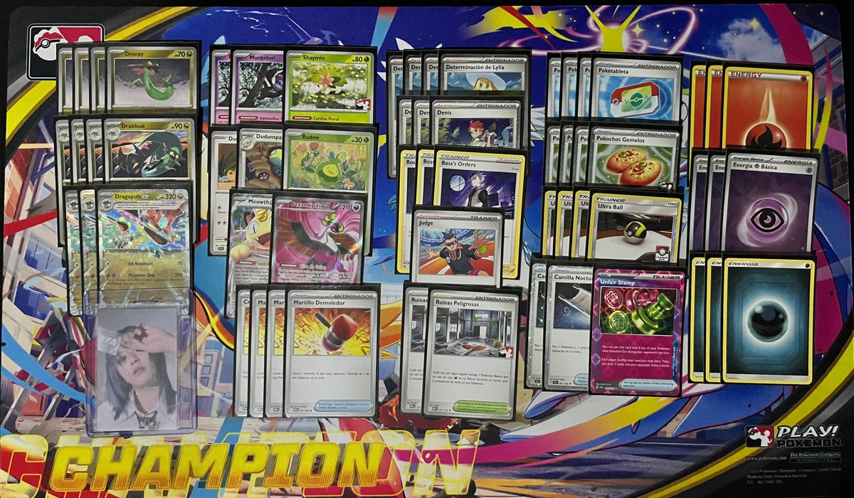 LicJavierBS's tweet photo. League Cup Champion! 🏆 Dragapult + Hammers was the winning combination today. Super happy with the deck's performance and this Champion playmat, which is spectacular! 💥
Thanks to @pokehawkeye for making this list!! https://t.co/SdNUrXCWFY