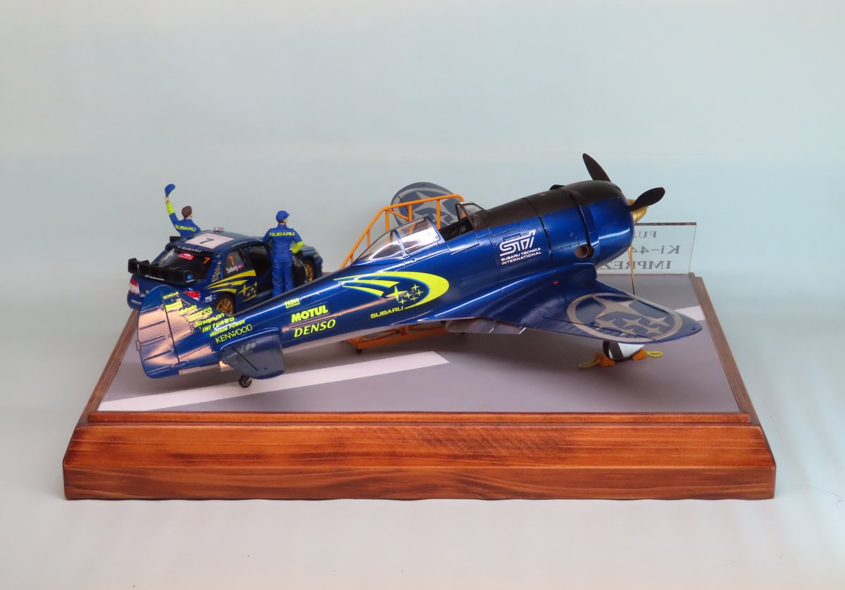 erunoDC's tweet photo. ハセガワ1/32鍾馗「SUBARU」完成しました！

「03年WRC年間優勝を獲得したスバルが、北米向けプロモーション用に二式戦を新造」っという妄想。

久しぶりの飛行機作品がネタで申し訳ないｗ
昨年の #関西シルバーウイングス にて頂いて、真面目で凄い作品は既にたくさんあるので、何か面白い事を、と。 https://t.co/hv3T5GjL1O