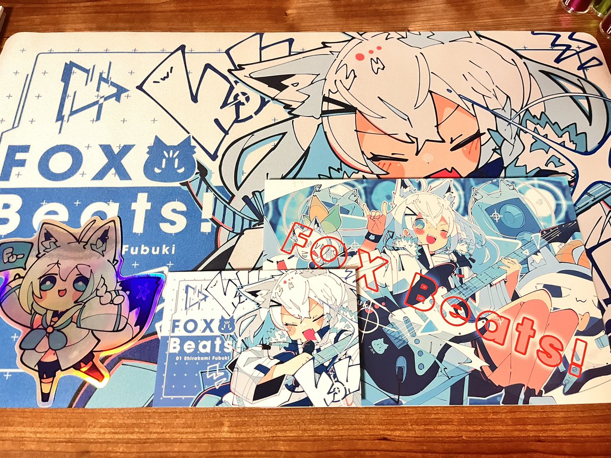 戦利品④ Haる先生のMVアートワーク本とデカステッカーとプレイマット