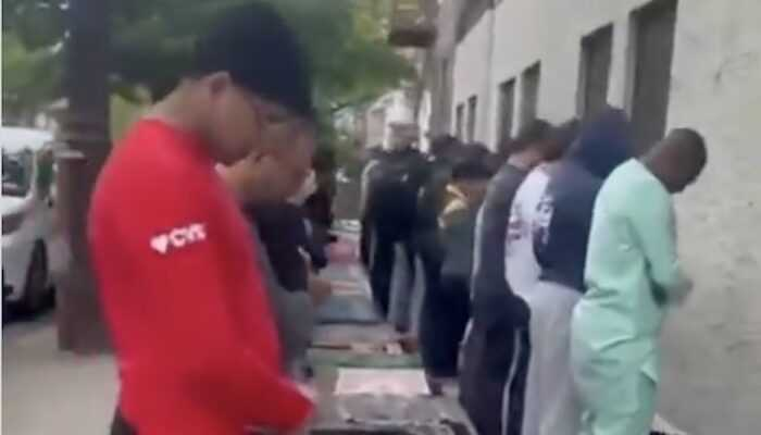 jihadwatchRS's tweet photo. NYC: Muslims carry out prayers directly outside all girls’ Jewish school

Why do they do this? There is a mosque nearby. The idea, however, is to intimidate everyone in the school, and everyone connected with the school and in its vicinity. It’s a declaration not only that the Muslims are present, but that Allahu akbar — that is, Allah is greater, greater than your god, and one day he will seize the domains of the false gods and give them to the Muslims. This display is designed to frighten non-Muslims, and make them feel subtly threatened. Here yet again we see the command being carried out: “Make ready for them all that you can of force and of warhorses, so that by them you may strike terror in the enemy of Allah and your enemy…” — Qur’an 8:60