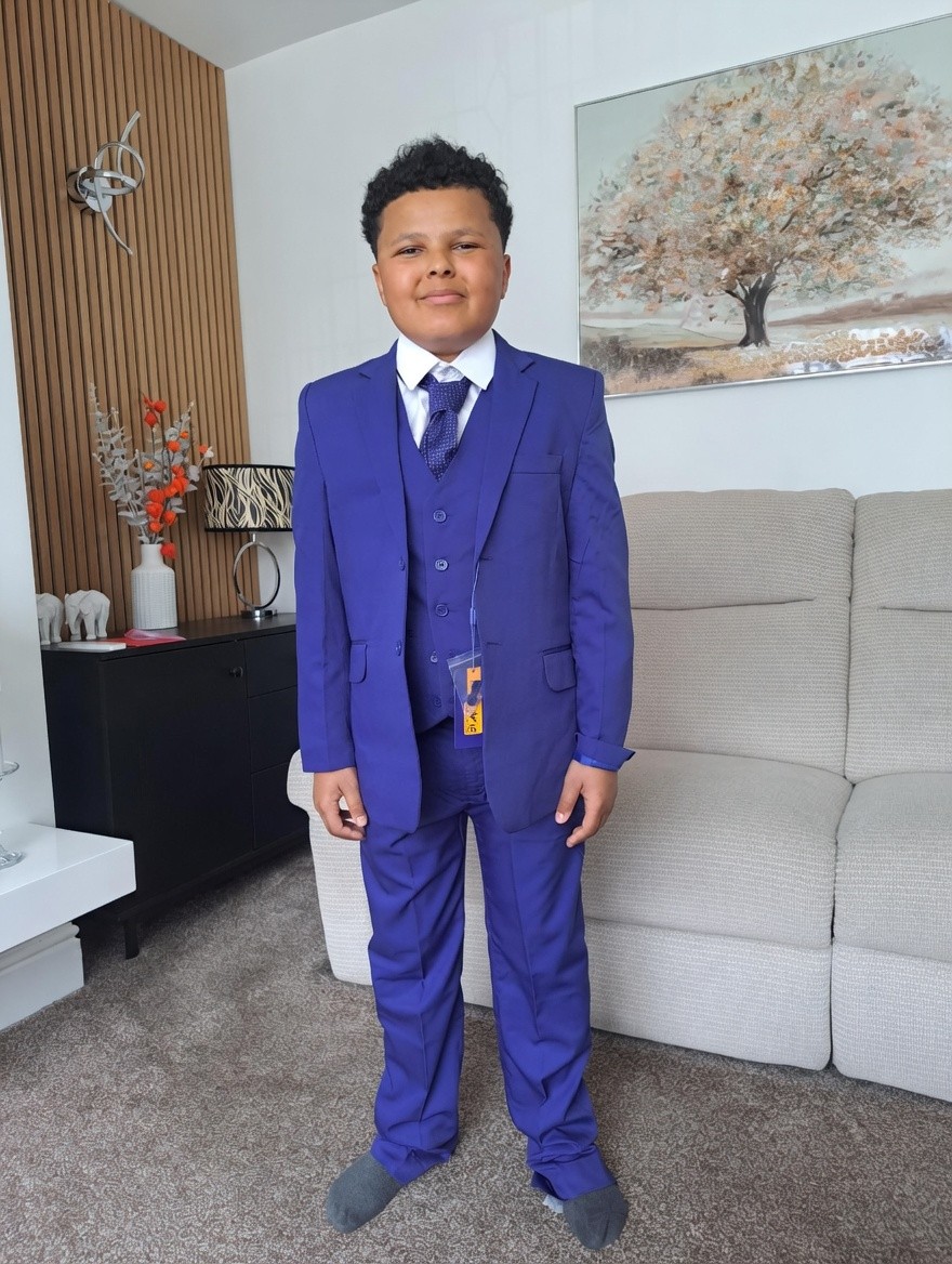 56Neil's tweet photo. Our grandson Jacob all suited up for his end of year dance bless him ! https://t.co/SLvgUdr1tp