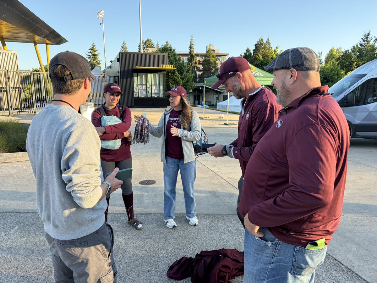 brianogden's tweet photo. Behind the scenes in Eugene:

▪️ @laniricketts10 snapping photos of @Coach_Ricketts through the glass at the press conference 
▪️ The parents’ postgame interview about their pregame broccoli delivery

It was a wild and whacky weekend out west 😅 https://t.co/97MNfD4f4o