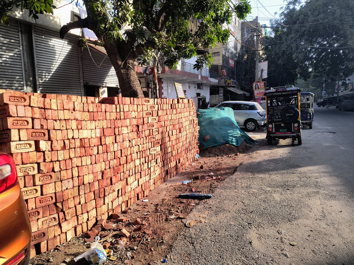 Learnwithmayur's tweet photo. This is how footpath are blocked. Private construction means encroachment of public spaces . Will any authority take action or just turn a blind eye to this ? 
Old Rajinder Nagar is turning into a nightmare !! https://t.co/nS1OcEu7B1