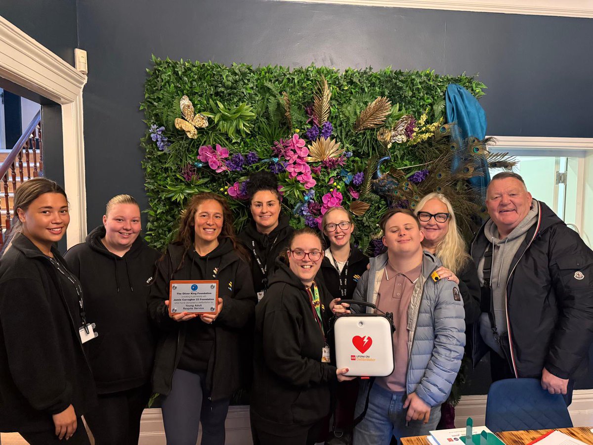 TheOKFoundation's tweet photo. Thomas, Toni and all the amazing staff and young adults from The Young Adults Respite Services in Huyton receiving their defibrillator from Mark King OBE after a fantastic morning of CPR and defibrillator training with everybody. 💙

#TheOliverKingFoundation #Defibrillator https://t.co/7GT4Iev7lK