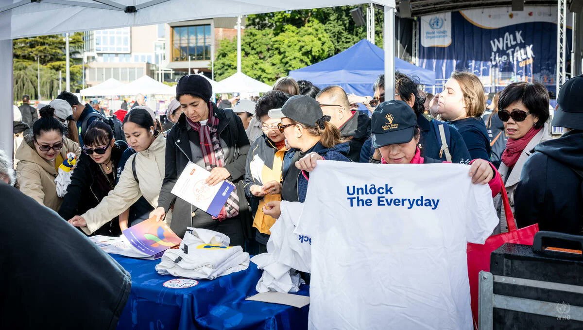 _ATscale's tweet photo. yesterday’s Walk the Talk event ahead of #WHA79 in Geneva, participants including WHO Director-General @DrTedros participated in the #MeAndMyAT challenge to spotlight how assistive technology supports health, participation, and inclusion. 👓🦽🦿🦻📱

https://t.co/i4bX89rUKK https://t.co/6txkqFTURF