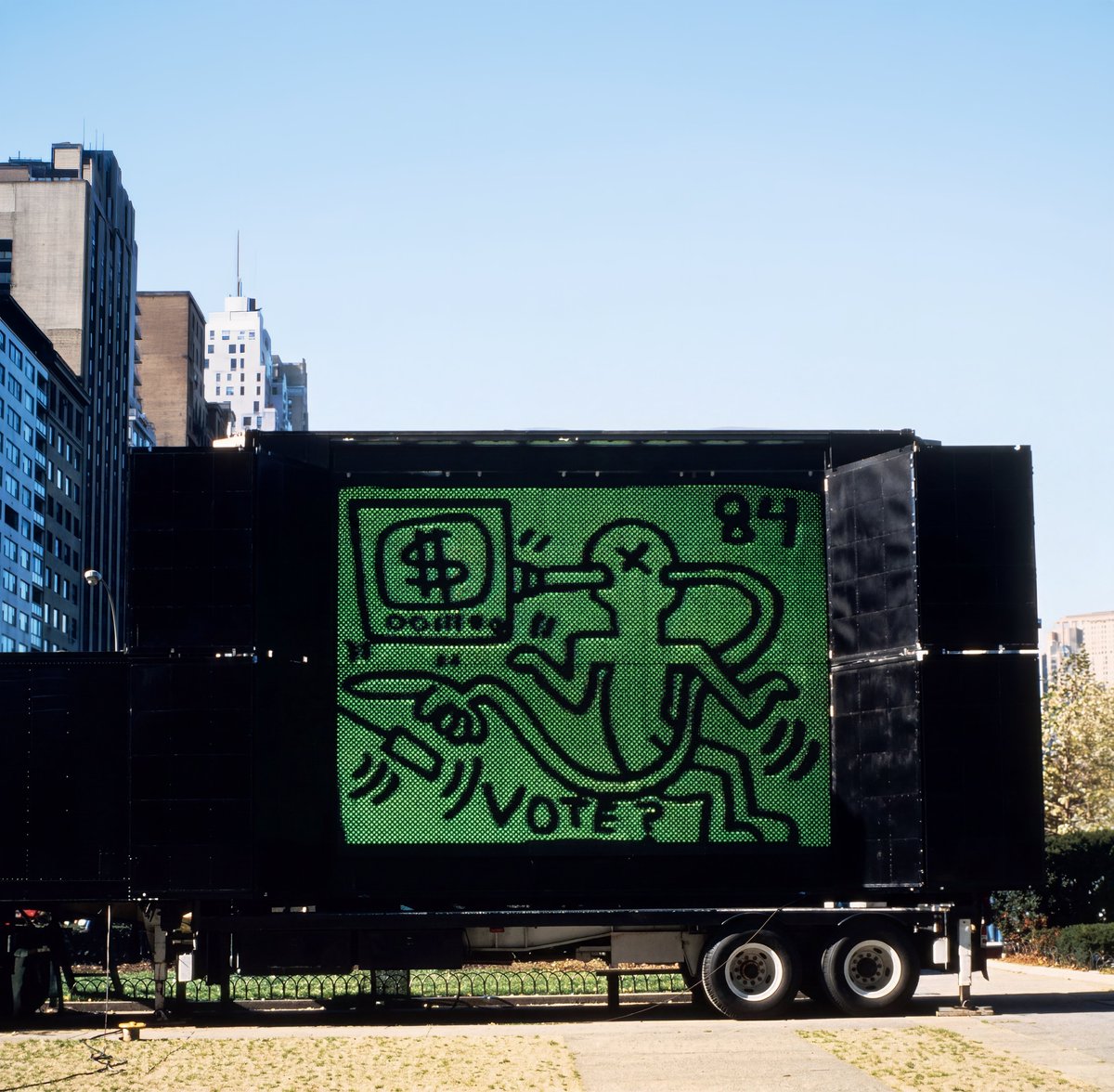 Noahbolanowski's tweet photo. Keith Haring in 1983: "The thing in the subway was that it proved that you don't have to get the seal of approval from... any sort of authoritative art person for it to be real art... I had to do it as graffiti... cutting through all those barriers & putting it there directly."

Below: Untitled by Keith Haring for Sign on a Truck by Jenny Holzer, New York City (November 3-5, 1984).