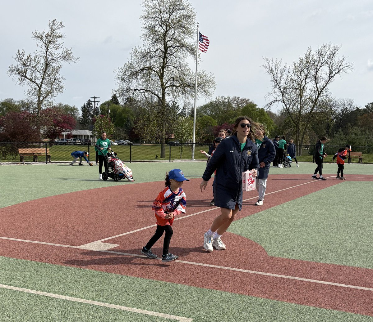 MidlandPS's tweet photo. The Midland High girls' JV and varsity soccer players and Coach Rodrico Barassi spent a recent Saturday at the Midland Miracle Field. In total, over 25 volunteer Chemic athletes spent their morning helping more than 60 fellow Midlanders experience the joy of playing baseball! https://t.co/it0JoAqojC