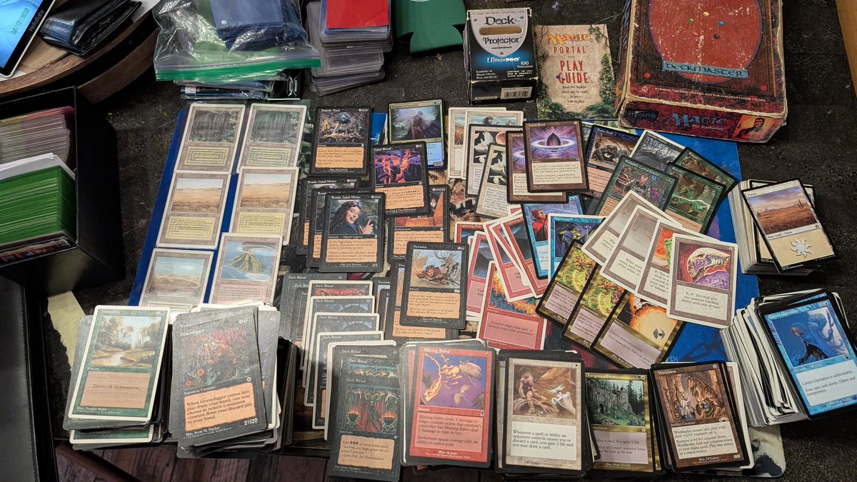 FromTheCryptMTG's tweet photo. A good buddy gifted me his vintage collection because he wanted to pass the joy along for when my kids grow up, because I play and collect. Quite possibly the coolest thing to sift through all my childhood again. This is insane! 🤤 Upgrades coming to my EDH Decks 🔥 https://t.co/NmWr0spNaR