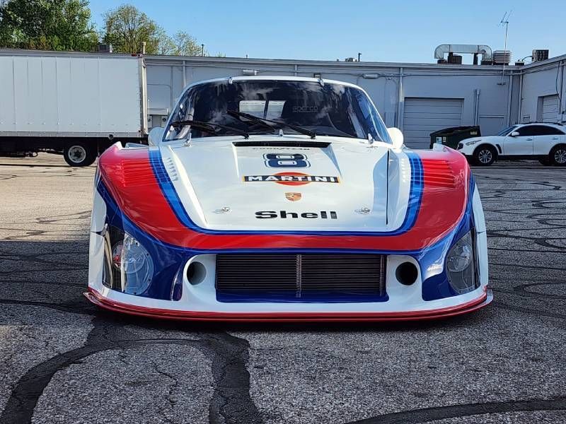 TurboKitsdotcom's tweet photo. Wow — this hand-built 935 K3 911 race car from the ’70s is breathtaking, now sporting upsized turbos sized by the team at https://t.co/IQ5drSFmIa! https://t.co/CPd4OhtVl7