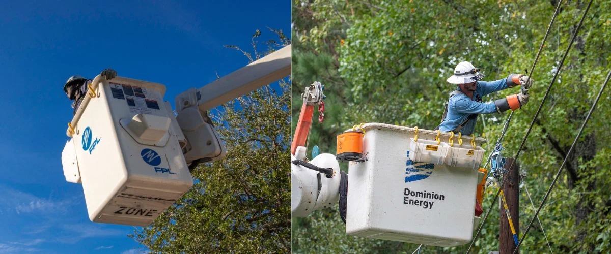 Two utility workers in separate bucket trucks, one with the FPL logo and the other with the Dominion Energy logo, working on power lines against a backdrop of trees and sky.