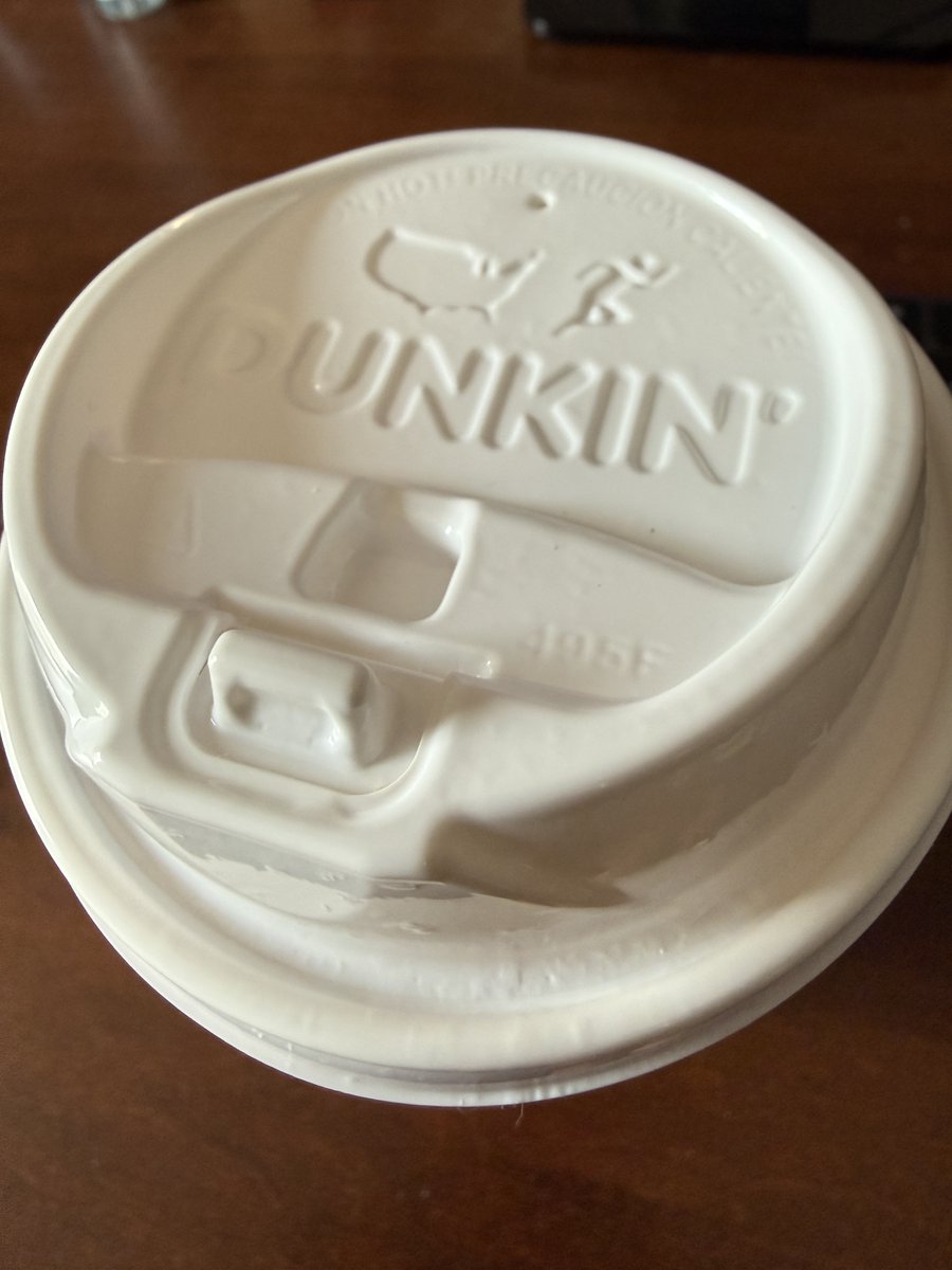jvaruzzo's tweet photo. This lid feels like the beginning of the end for @dunkindonuts . This is what happens when executives are surrounded by "yes" people and they lose touch. There is no world in which a Dunkin' corporate middle-manager uses this lid and says "Wow! We really nailed it!". You are scared to go to your boss and say "wtf - this lid completely sucks - what were they thinking?". 

Am I the only one who feels this way? 7 out of 10 times I can't get this open, and end up pushing the tab down when trying to lift it up, then the only fix is removing the lid from your boiling hot coffee while driving to push it back up - inevitably spilling hot coffee on myself (I know, first world problems).