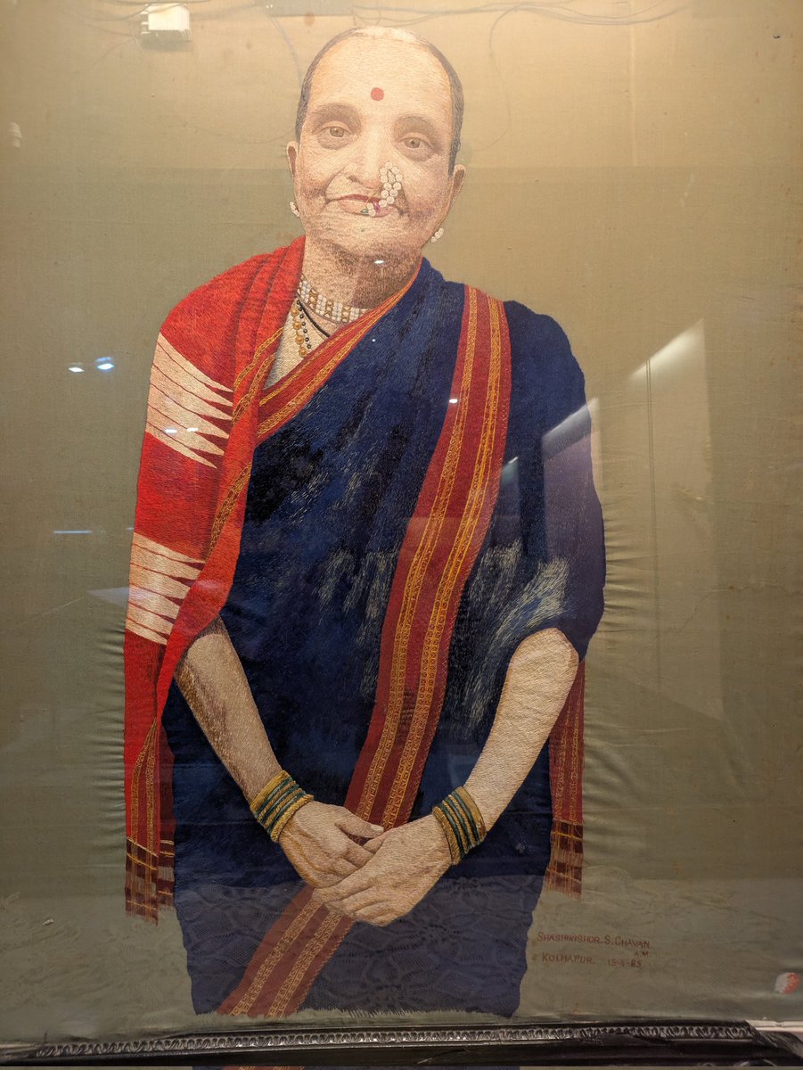 yenforblue's tweet photo. This world museum day...a fantastic #embroidery portrait of Late Mrs Kamalabai Kelkar that I saw at Raja Dinkar Kelkar Museum. It looks more like a painting. Superb intricate work. 
The photo does not do justice to the artist's work. #Pune #worldmuseumday https://t.co/69MY8VsDoy