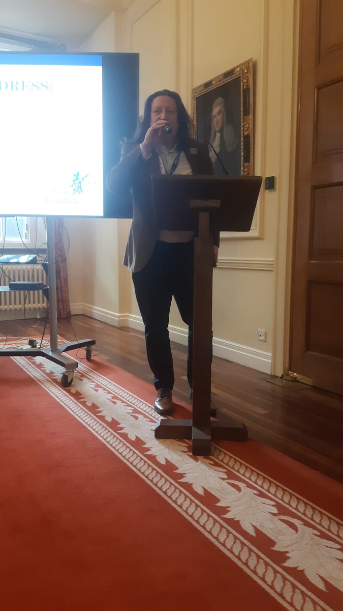 ThatcherCentre's tweet photo. 'What we want are simplified rules we can actually understand,' says Steve Barrett, @TVSteveBarrett barrister, in our fourth keynote of the day, 'Simplifying the Law.' As usual, he's on a roll! 'The thing that causes state collapse is the inconsistent implementation of the law.' 'Without clear, simple laws, society collapses...We are infantilised by this complex system...This idea that you should draft your laws with subjective outcomes...' 
You really should be here to get the full effect. Next year, maybe?🧑‍⚖️