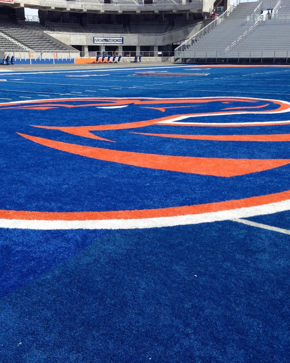 FanaticsCollect's tweet photo. Boise State University sells a game-used piece of their iconic blue turf for $25,000 👀

Former athletic director Gene Bleymaier made the decision to transition to a blue field 40 years ago, and it has since become one of the most recognizable fields in college football.

Now, as the program transitions into a new conference, they are selling some of the field to fund player support and upgrades.

For $25,000, the winner receives a 400-square-foot sheet professionally installed in their home.

(via @TheAthletic)