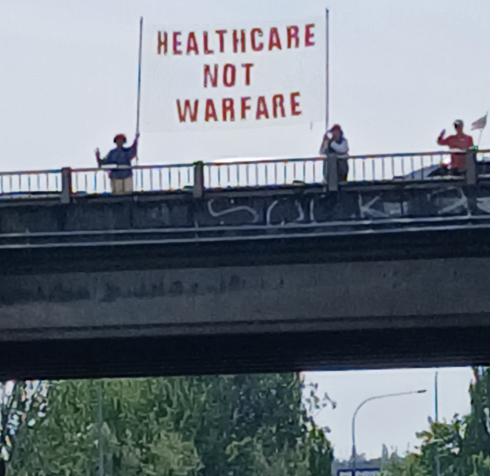 backboneprog's tweet photo. Recent banner deployments from South Burlington, VT; Kirkland, WA; Fife, WA; and Cleveland, OH. From coast to coast, people like you are taking action. Thank you for all the continued efforts. https://t.co/FTbOcElV4c