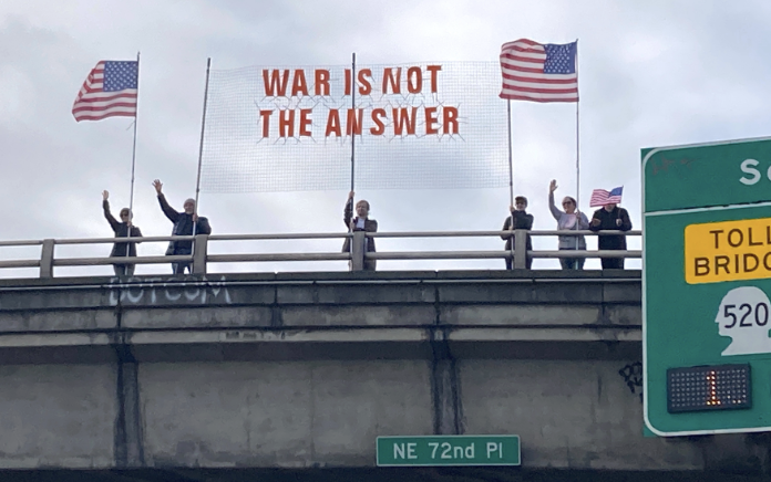 backboneprog's tweet photo. Recent banner deployments from South Burlington, VT; Kirkland, WA; Fife, WA; and Cleveland, OH. From coast to coast, people like you are taking action. Thank you for all the continued efforts. https://t.co/FTbOcElV4c