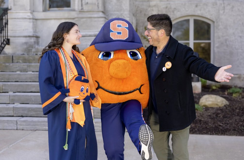 SyracuseUToday's tweet photo. Being Otto runs in the family! 🍊 One's an OG Otto from the '90s. The other just graduated. Together, @MitchMessinger and Sarah Jacoby created the first-ever family legacy for #SyracuseU's favorite mascot.🧡
https://t.co/AoyB8J8lag https://t.co/Gwb4g05dPR