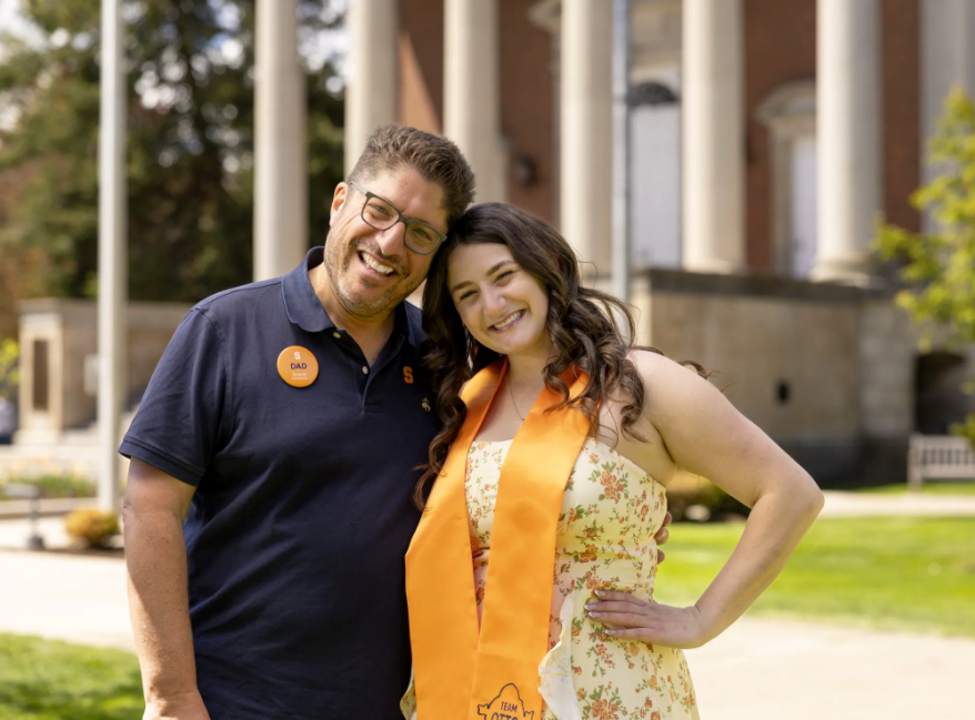 SyracuseUToday's tweet photo. Being Otto runs in the family! 🍊 One's an OG Otto from the '90s. The other just graduated. Together, @MitchMessinger and Sarah Jacoby created the first-ever family legacy for #SyracuseU's favorite mascot.🧡
https://t.co/AoyB8J8lag https://t.co/Gwb4g05dPR