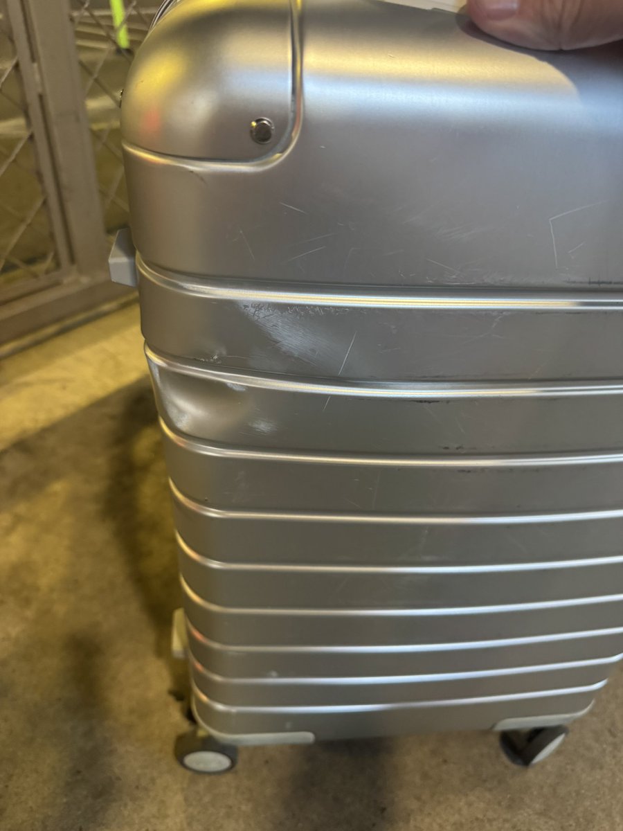 JeremyWalll's tweet photo. I’m not one to complain but @SouthwestAir this is outrageous. You made me check my bag and this is the result… seems a bit excessive to get a dent that deep to basically a brand new suitcase. https://t.co/h8QYsmFleS