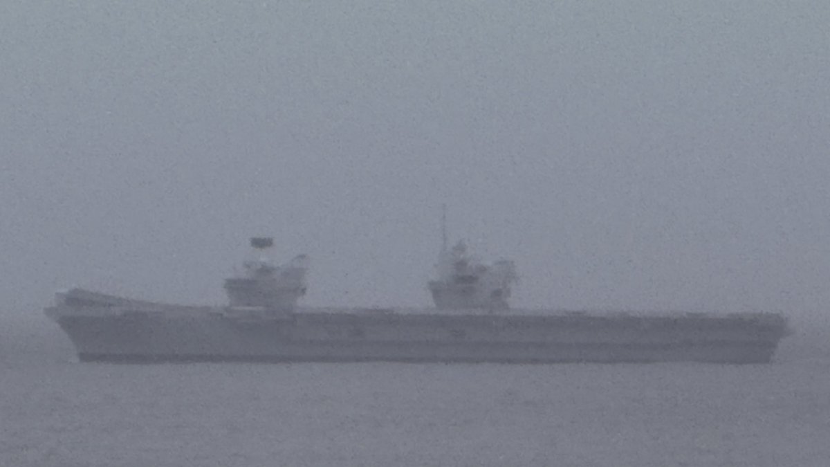 JonoG1's tweet photo. Seeing @HMSQNLZ from Aldi car park in Newquay, my home town, is virtually a bucket list moment. I served on HMS Invincible and would absolutely LOVE to go onboard her. 😍🫡 https://t.co/PZ8Bmj6EBX