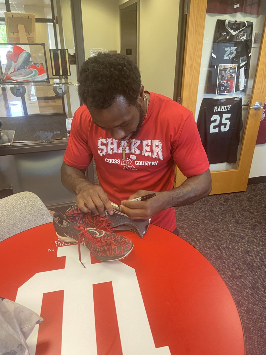 IUE_ENTR's tweet photo. The excitement continues as Deandre Hall retires his cleats to @iueast Professor Tim Scales. The impact and the memories from the time Dre has spent as a student and an athlete @iueredwolves will never be forgotten. @IUE_TFXC @DeandreHall11 https://t.co/q5uU5IJaHN