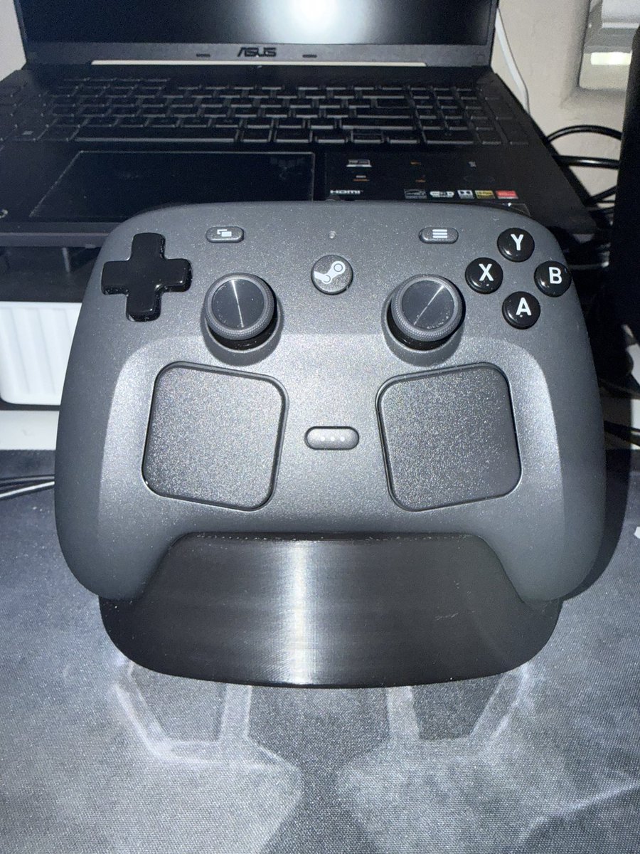suxor99's tweet photo. 3D printed dock for my Steam Controller! Freaking love it. https://t.co/xggjCDBOik